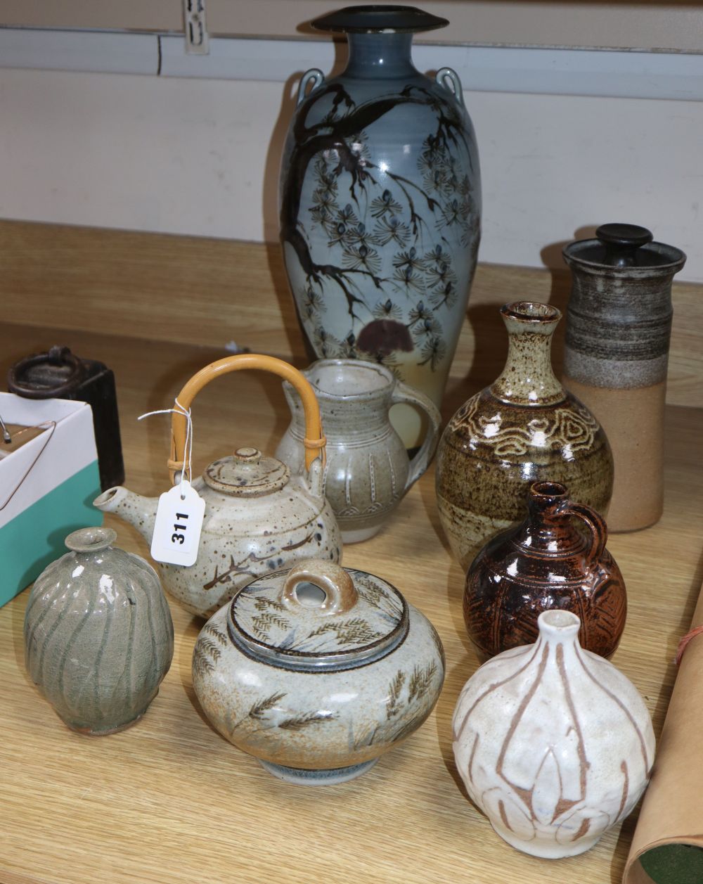 Seven Studio pottery vessels, including a Roger Cockram bottle vase, 22cm and a teapot marked JM in an oval